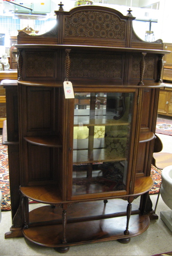 Appraisal: A VICTORIAN MAHOGANY CURIO CABINET American th century The cabinet