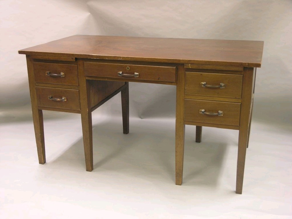 Appraisal: An early th century mahogany office desk single drawer above