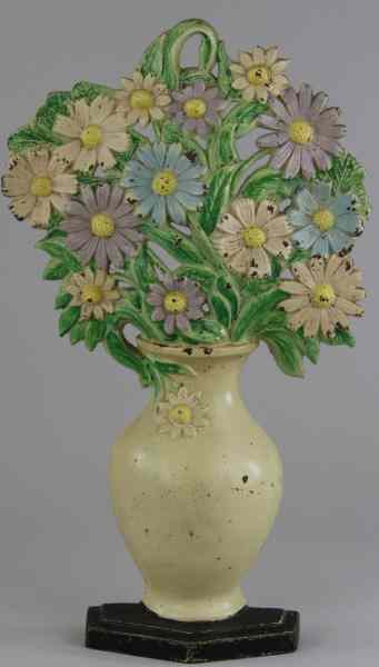 Appraisal: COSMOS IN VASE DOORSTOP Hubley '' '' largest of the