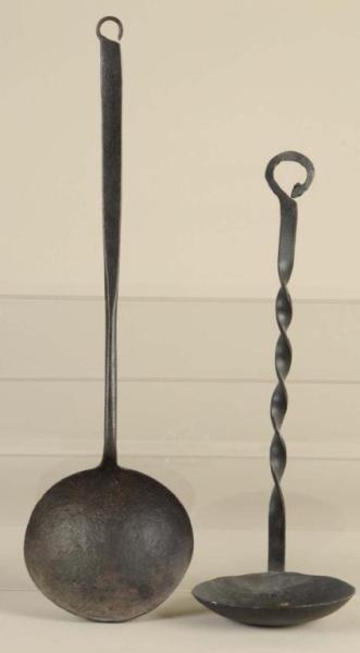 Appraisal: Lot of Iron Ladles Description One th century and one