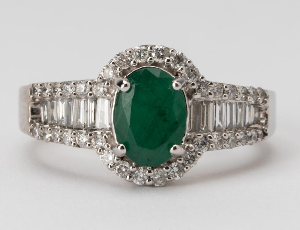 Appraisal: KARAT WHITE GOLD DIAMOND EMERALD RINGCenter set with one oval