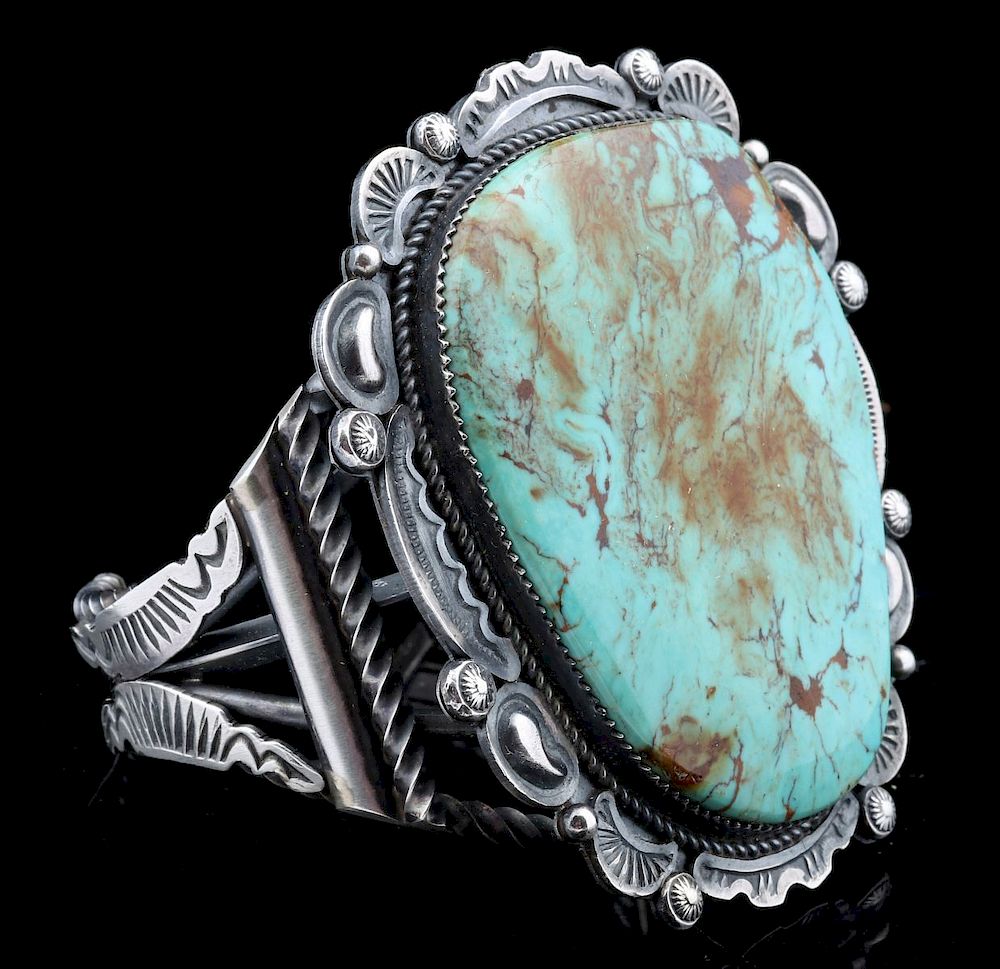 Appraisal: GILBERT TOM CUFF BRACELET W LARGE TURQUOISE STONE The large