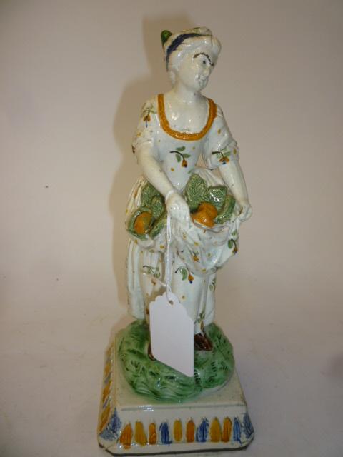 Appraisal: A PRATTWARE FIGURE late th century modelled as Summer the