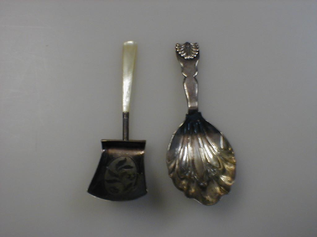 Appraisal: Two George III silver caddy spoons One in the form