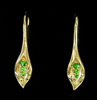 Appraisal: A Pair of Tsavorite Garnet Set Gold Earrings k yellow