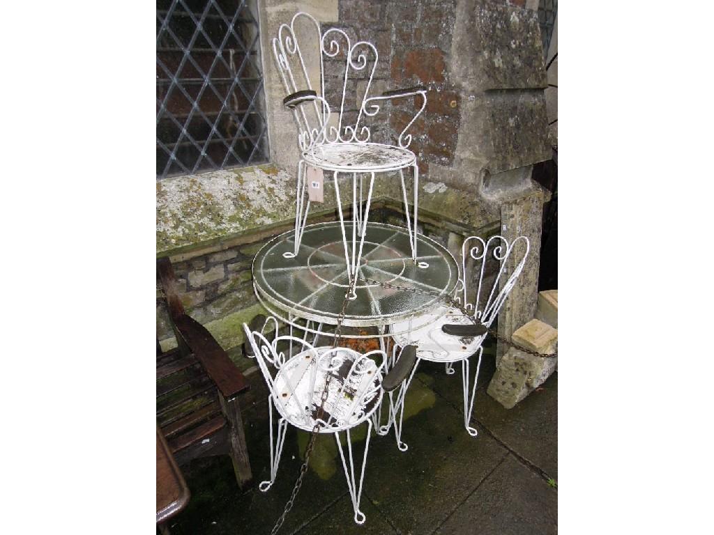 Appraisal: A decorative garden table of circular form together with a