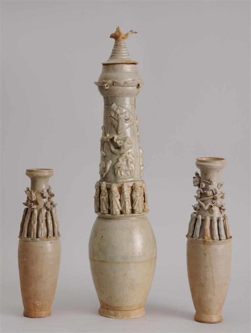 Appraisal: THREE SONG CELADON-GLAZED FUNERARY JARS Each slender ovoid bowl with