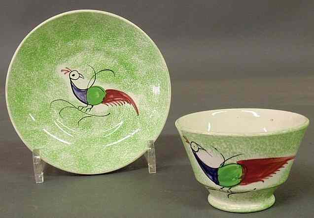 Appraisal: Peafowl green spatterware handleless cup and saucer early th c