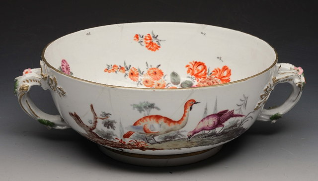 Appraisal: A CHELSEA PORCELAIN TWO HANDLED CUELLE painted with exotic birds