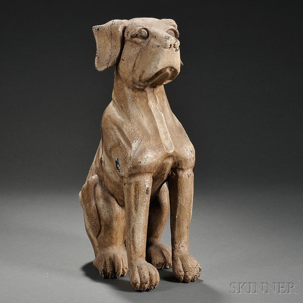 Appraisal: Painted and Carved Composition Sitting Dog Figure early th century