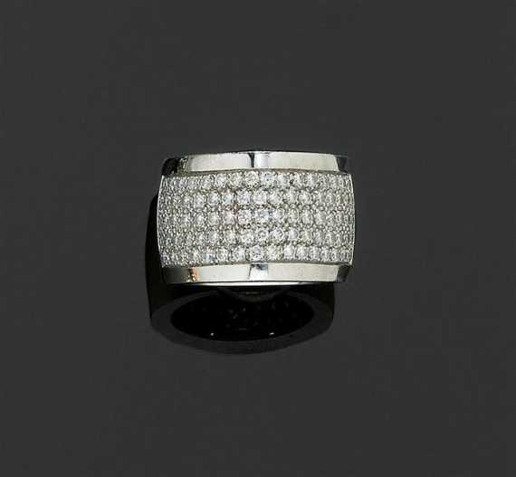 Appraisal: BRILLIANT AND GOLD RING M KUNC White gold g Broad