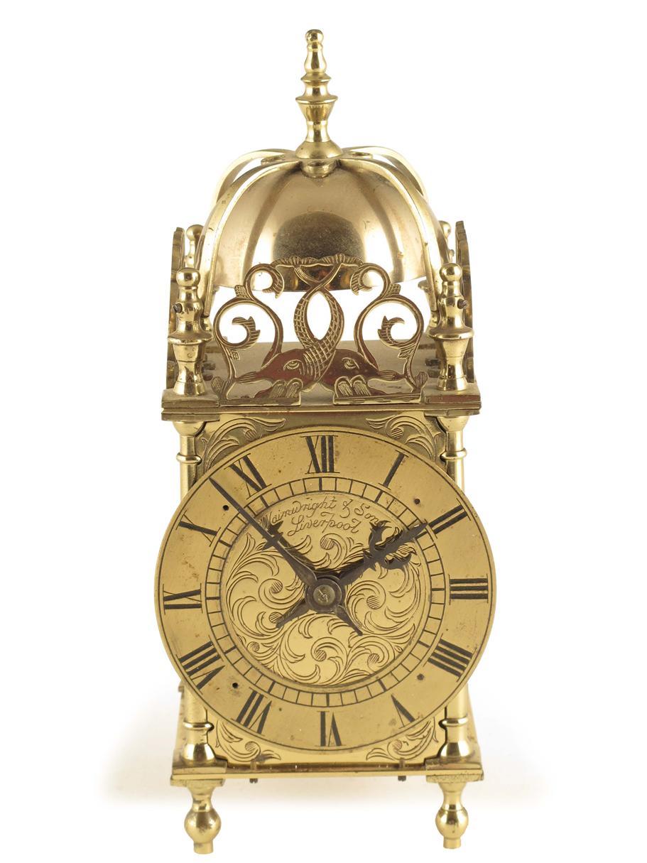 Appraisal: A brass cased lantern timepiece