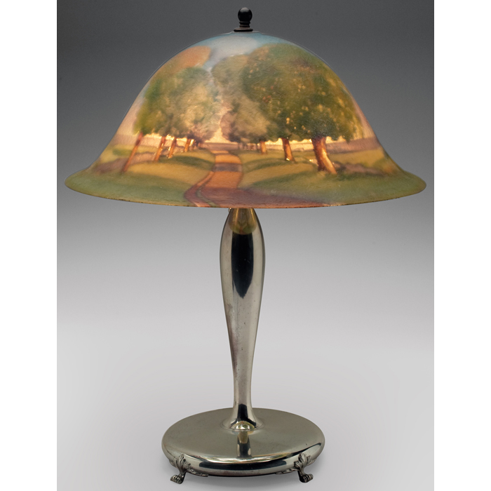 Appraisal: Pairpoint lamp reverse painted shade landscape design with a winding