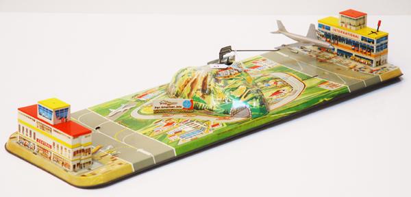 Appraisal: TINPLATE PANAM AIRPORT WITH AEROPLANE KEY MISSING AND UNBOXED G