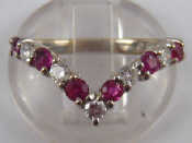 Appraisal: An carat white gold ruby and diamond wishbone ring the