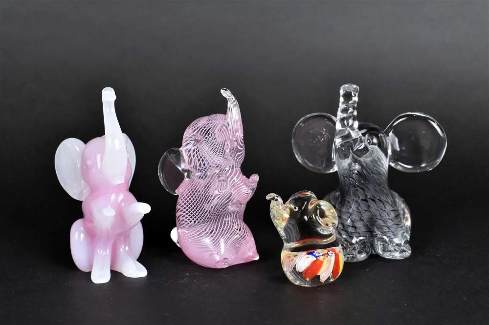 Appraisal: SEVEN INTERNALLY DECORATED GLASS ELEPHANTS th Century All unsigned Swedish