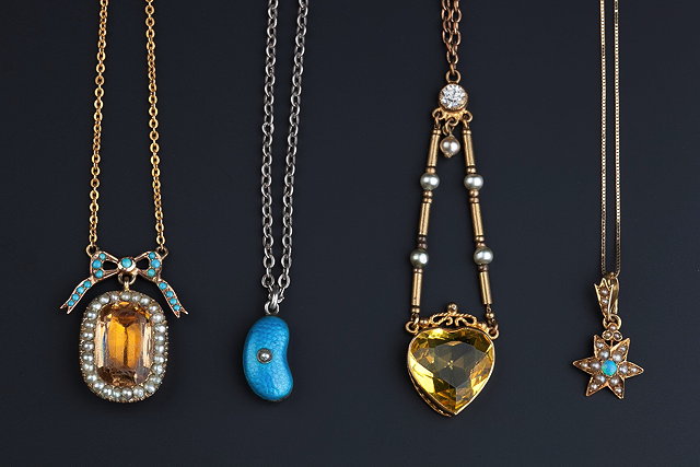 Appraisal: FOUR GEM SET PENDANT NECKLACES comprising an opal and seed