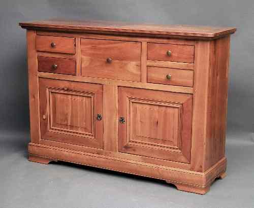 Appraisal: A modern figured wood sideboard of th Century design the