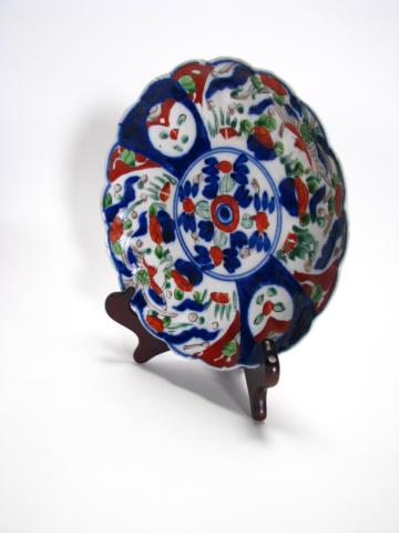 Appraisal: Imari th Century Porcelain Plate depicting ceremonial mask and vegetation