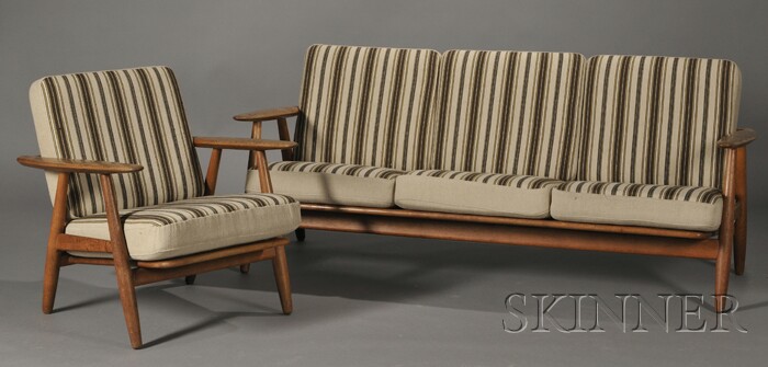 Appraisal: Hans Wegner Sofa and Armchair Red oak and upholstery Sofa