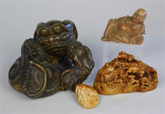 Appraisal: CHINESE CARVED HARDSTONE FIGURE OF AN ANIMATED FOO DOG length