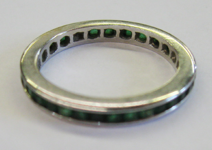 Appraisal: American Fourteen-Karat White Gold and Emerald Eternity Band the white