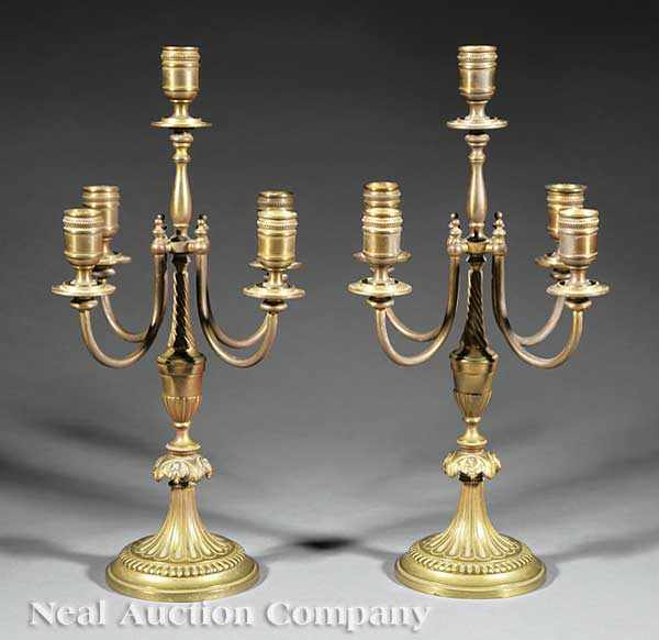 Appraisal: A Pair of Baccarat Gilt Bronze Five-Light Candelabra th c