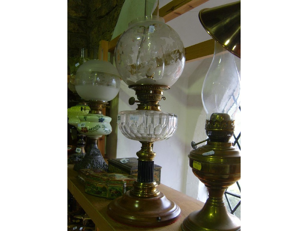 Appraisal: A late th century oil lamp with fluted brass column