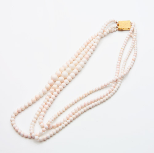 Appraisal: 's Angel skin coral necklace with a k yellow gold