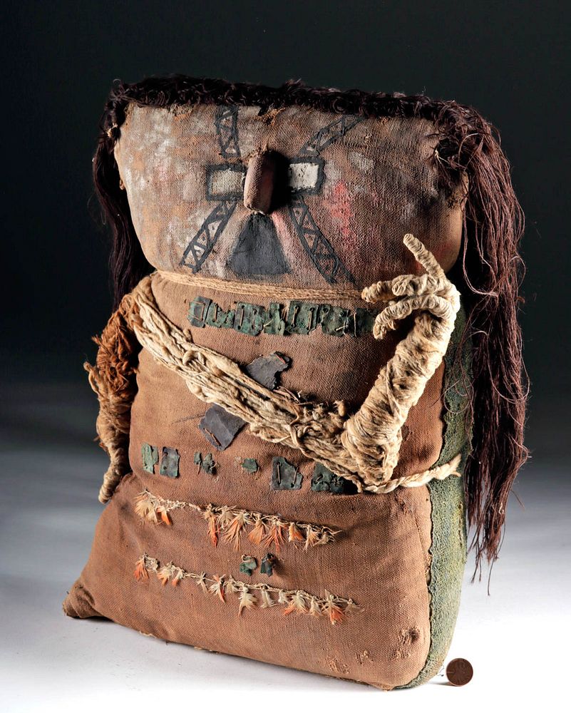 Appraisal: Chancay Mummy Bundle w Textile Copper Feathers Originally Listed At