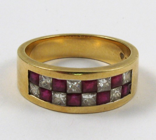 Appraisal: RUBY DIAMOND AND EIGHTEEN KARAT GOLD RING set with eight