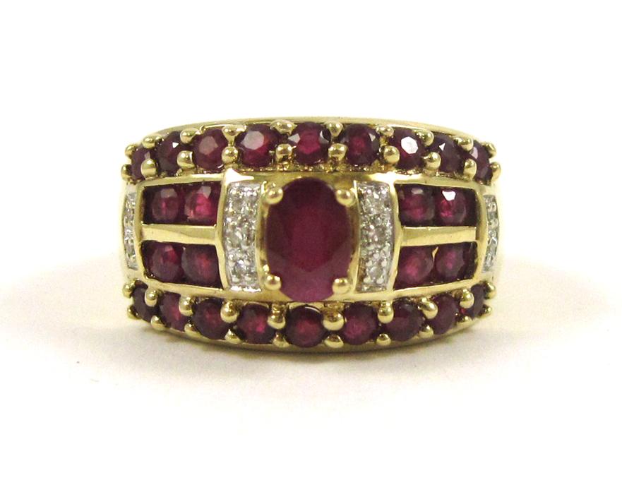 Appraisal: RUBY DIAMOND AND TEN KARAT GOLD RING with round-cut rubies