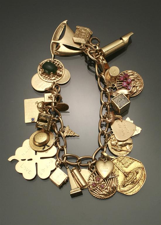 Appraisal: Tested -Karat Yellow-Gold Charm Bracelet Suspending -karat and -karat yellow-gold