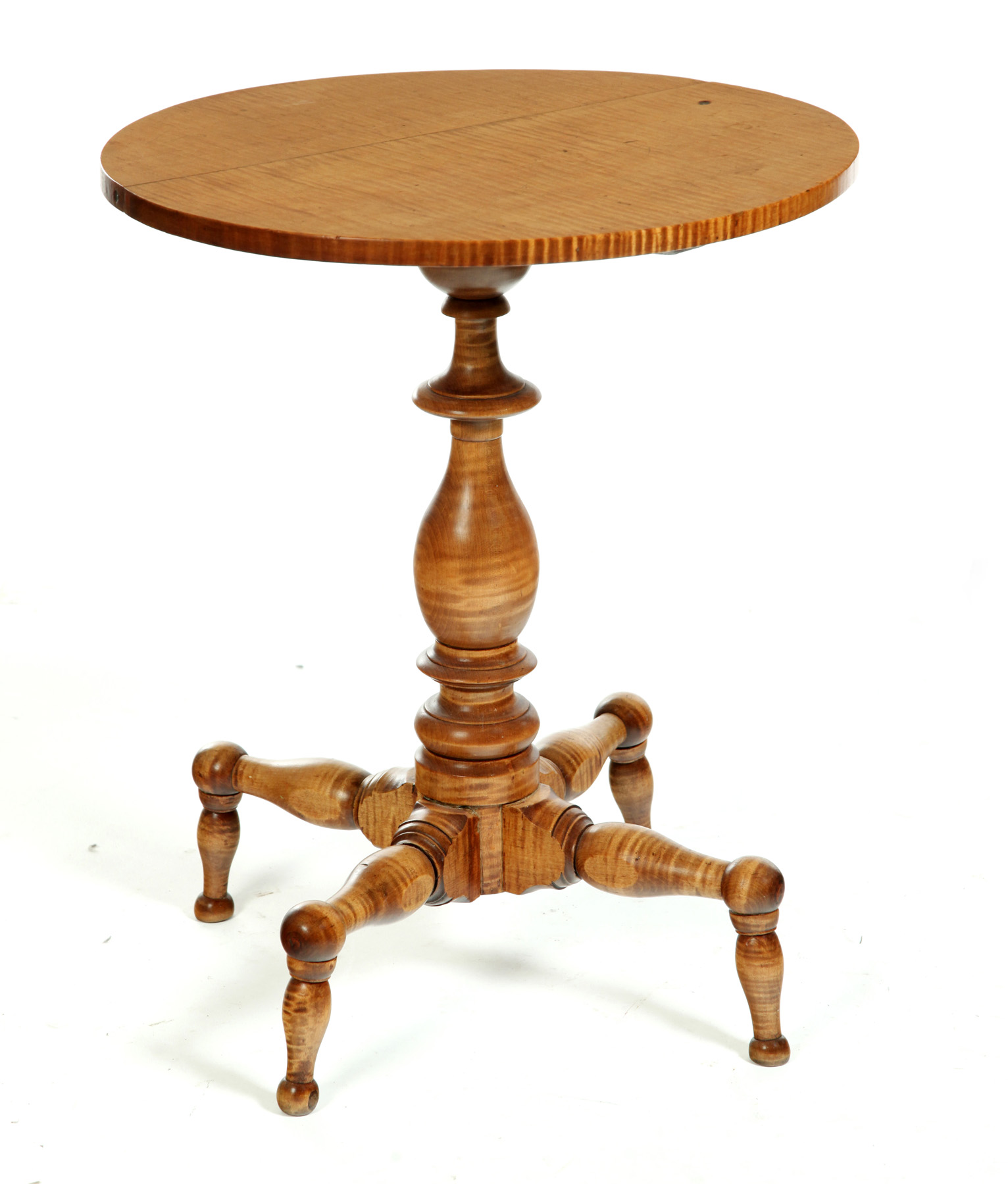 Appraisal: TIGER MAPLE CANDLESTAND American mid th century Round top turned