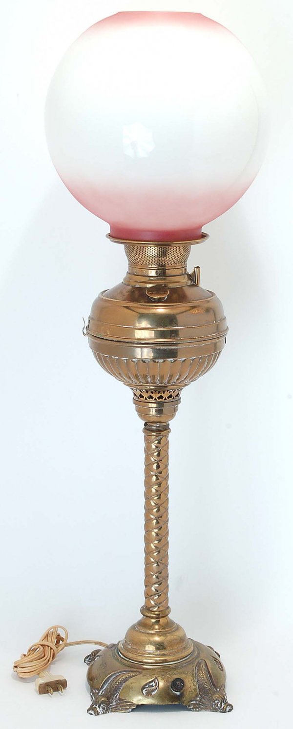 Appraisal: Brass banquet lamp Ribbed font supported on a quilted column