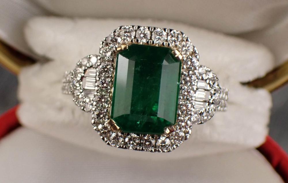 Appraisal: EMERALD DIAMOND AND FOURTEEN KARAT GOLD RING The k white