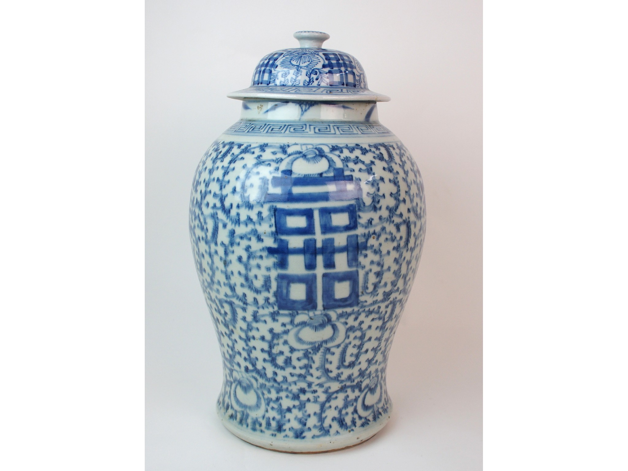 Appraisal: A Chinese blue and white tea jarpainted with calligraphy and