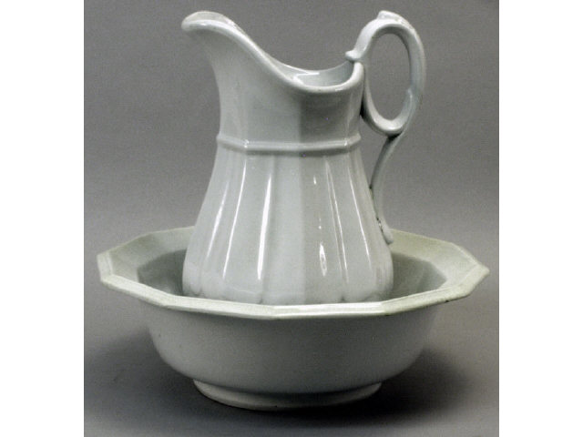 Appraisal: Wash bowl and pitcher in white marked Davenport Ironstone Estimate