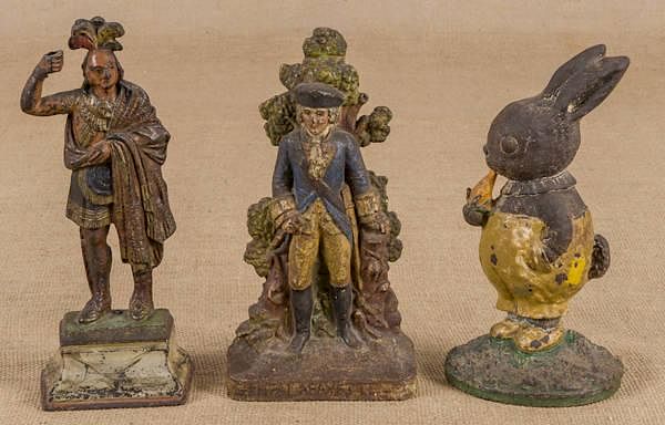 Appraisal: Three cast iron doorstops to include George Wash Three cast