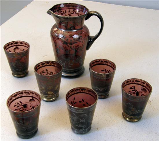 Appraisal: Amethyst coloured glass lemonade jug and six glasses with silver