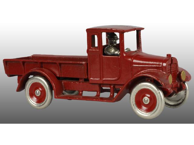 Appraisal: Cast Iron Arcade Red Baby Stationary Bed Truck Description Toy