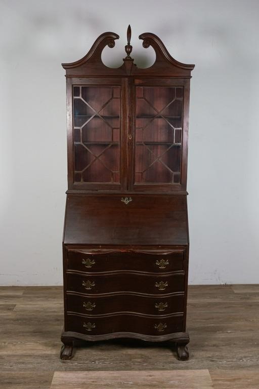 Appraisal: CHIPPENDALE STYLE MAHOGANY SECRETARYChippendale Style mahogany secretary in a Georgian