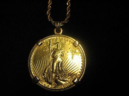 Appraisal: karat yellow gold medallion pendant U S double eagle set