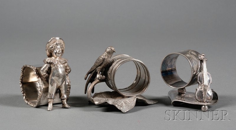 Appraisal: Three American Victorian Silverplate Figural Napkin Rings late th century