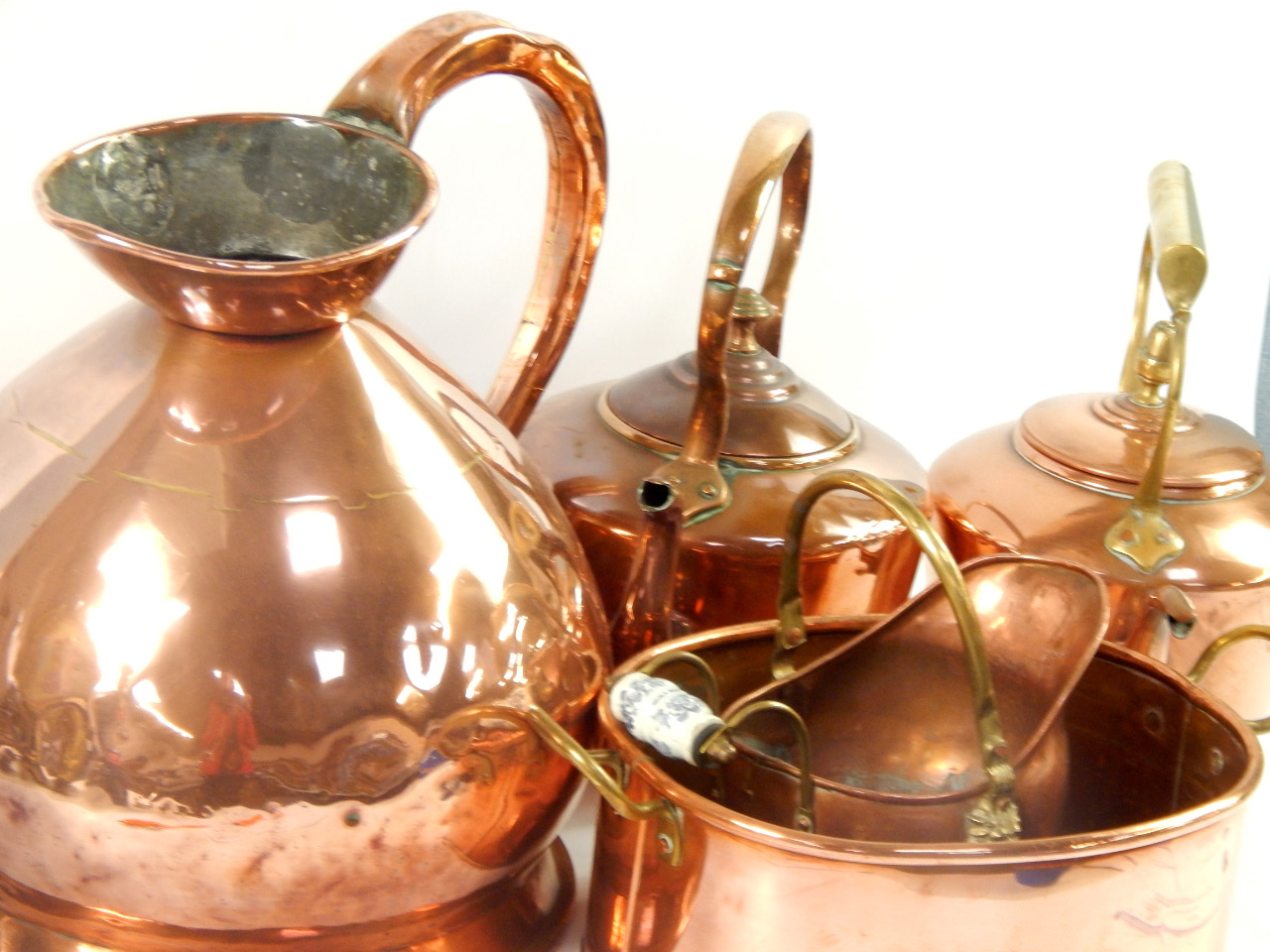 Appraisal: A Victorian copper gallon jug two kettles jam pan dough