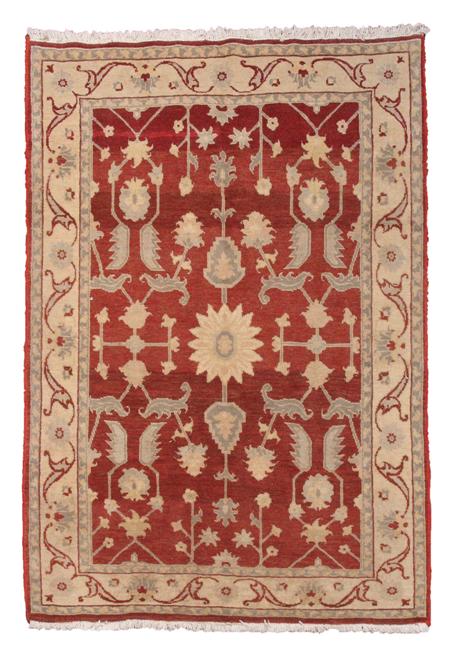 Appraisal: A modern Persian Ziegler design rug the madder field with