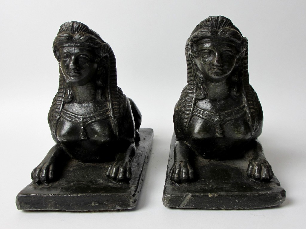 Appraisal: A pair of Regency lead painted model of sphinxes cm