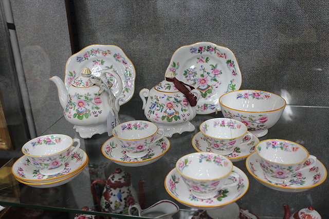 Appraisal: A VICTORIAN STAFFORDSHIRE FLORAL DECORATED CHILD'S PART TEA SET with