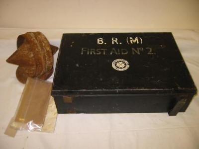 Appraisal: A metal First Aid Box inscribed B R M wide