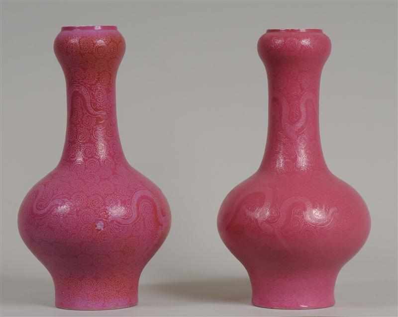 Appraisal: PAIR OF CHINESE ROSE ENAMELED PORCELAIN VASES WITH SWELLING NECKS